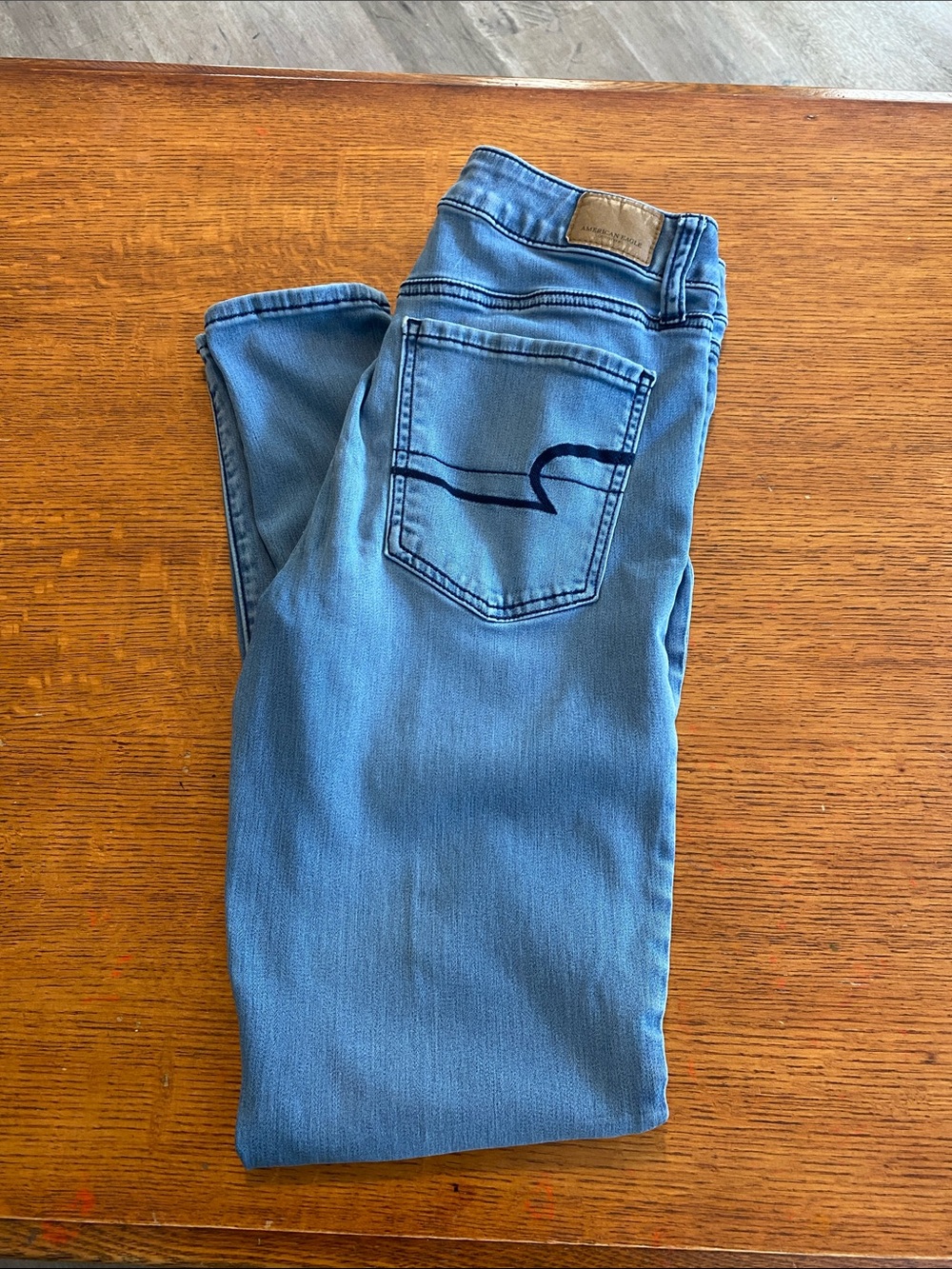 American Eagle Outfitters Light Blue Stretch Jeans with Embroidered Waistband